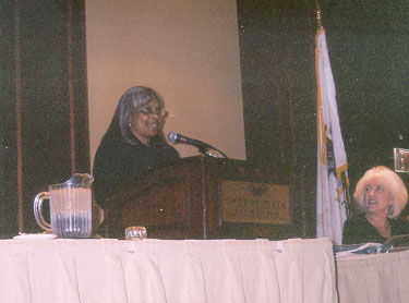 Head Start's Katie Williams welcomes participants.