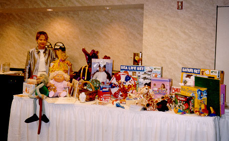 Sandy Ginther shows off the treats at the Family Room.