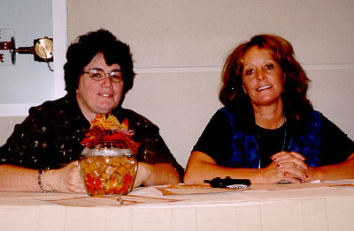 Kathy and Joan wait for families to arrive at the conference.